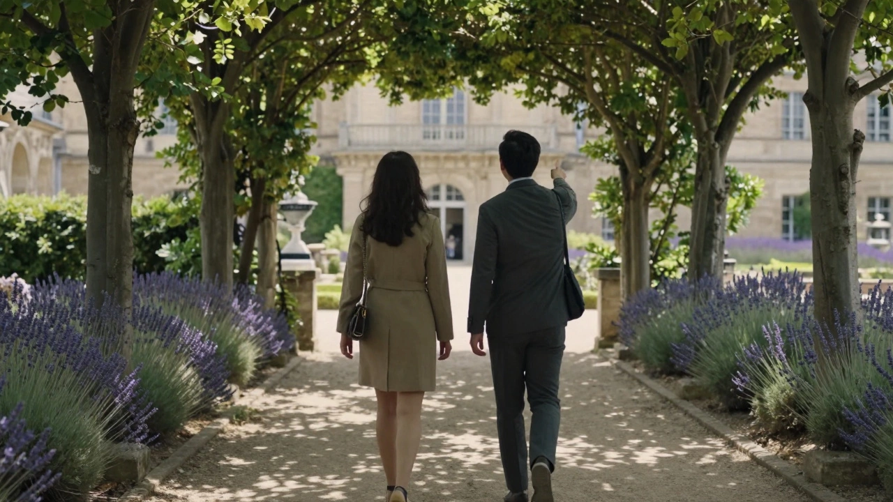 A companion and traveler walk through a garden in Aix-en-Provence, exploring local architecture and nature together.